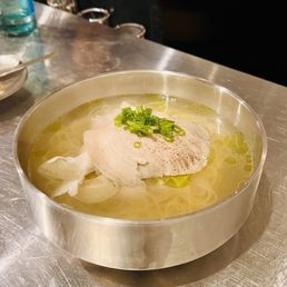 GOMTANG 23 - Sub rice noodles 2 - seasoned pork broth, sliced pork, chive oil, served with a side of house-made kimchi & chili shrimp paste
