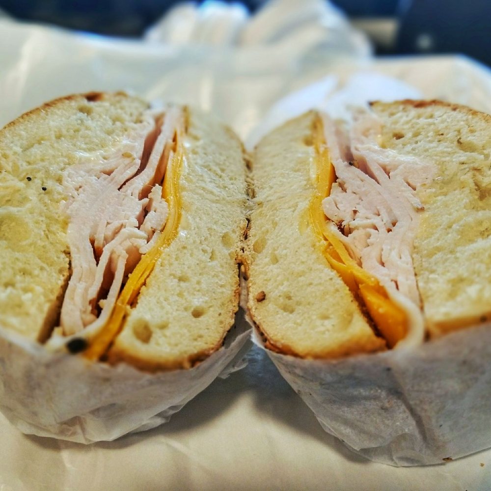 Pick a Bagel - Turkey breast and cheddar on an everything bagel. - Bagels Near Me - New York, New York Pick a Bagel - Turkey breast and cheddar on an everything bagel. - Bagels Near Me - New York, New York