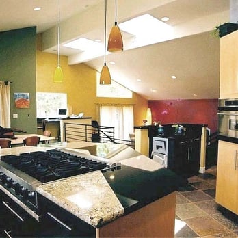 Serra Tile and Stone Inc. - Island top is made up of two different granite slabs, one white, one black - Countertop Installation Near Me Serra Tile and Stone Inc. - Island top is made up of two different granite slabs, one white, one black - Countertop Installation Near Me