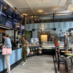 Amélie's French Bakery & Café - Counter with bank vault