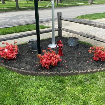 Tees Lawn Service - a fire hydrant in a flower bed - Lawn Services Near Me - Terre Haute, Indiana Tees Lawn Service - a fire hydrant in a flower bed - Lawn Services Near Me - Terre Haute, Indiana