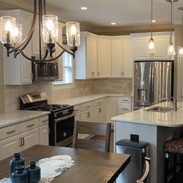a kitchen and dining room a kitchen and dining room