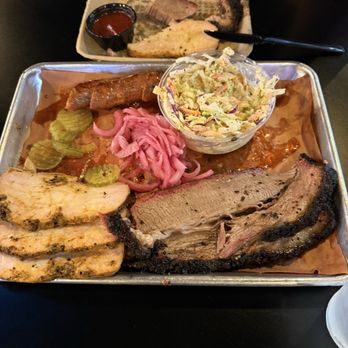 Wild BBQ - Tandoori smoked turkey, lean brisket, beef brisket sausage, coleslaw. Spicy BBQ sauce - Barbeque Near Me - Tempe, Arizona Wild BBQ - Tandoori smoked turkey, lean brisket, beef brisket sausage, coleslaw. Spicy BBQ sauce - Barbeque Near Me - Tempe, Arizona