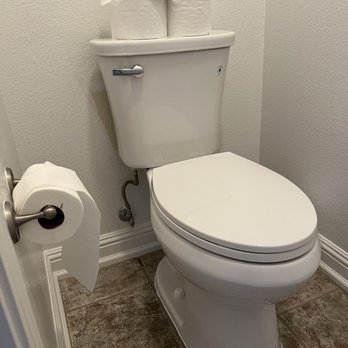 NG Rooter & Plumbing - Replacing old toilet seat with new - Plumbing Near Me