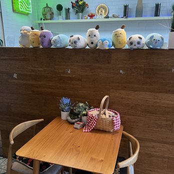 Eightfold Tea Shoppe - a table with a basket of stuffed animals - Bubble Tea Near Me - Hawaiian Gardens, California Eightfold Tea Shoppe - a table with a basket of stuffed animals - Bubble Tea Near Me - Hawaiian Gardens, California