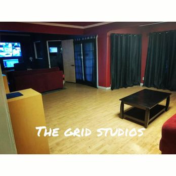 The Grid Studios - a living room with wood floors and a flat screen tv - Recording & Rehearsal Studios Near Me - Los Angeles, California The Grid Studios - a living room with wood floors and a flat screen tv - Recording & Rehearsal Studios Near Me - Los Angeles, California