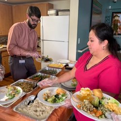 Ultimate Home Health Care - Serving food for the holidays!