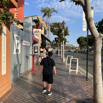 Strawberry Shack - a little boy walking down the sidewalk - Desserts Near Me - Carlsbad, California Strawberry Shack - a little boy walking down the sidewalk - Desserts Near Me - Carlsbad, California