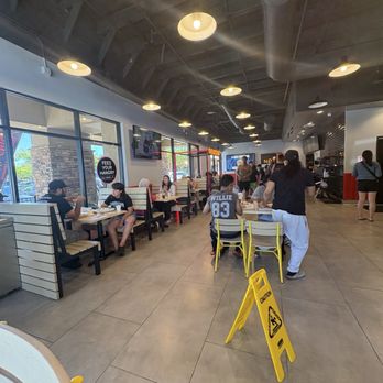 Angry Chickz - Inside - half of the seating area  There is also a covered patio - Chicken Shop Near Me - Elk Grove, California
