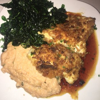 Islands Fish Grill - Islands Fish Grill famous Onion Encrusted Grouper with Fried Spinach and the Chef's Starch which was Caprese Grits - Seafood Near Me - Indialantic, Florida Islands Fish Grill - Islands Fish Grill famous Onion Encrusted Grouper with Fried Spinach and the Chef's Starch which was Caprese Grits - Seafood Near Me - Indialantic, Florida