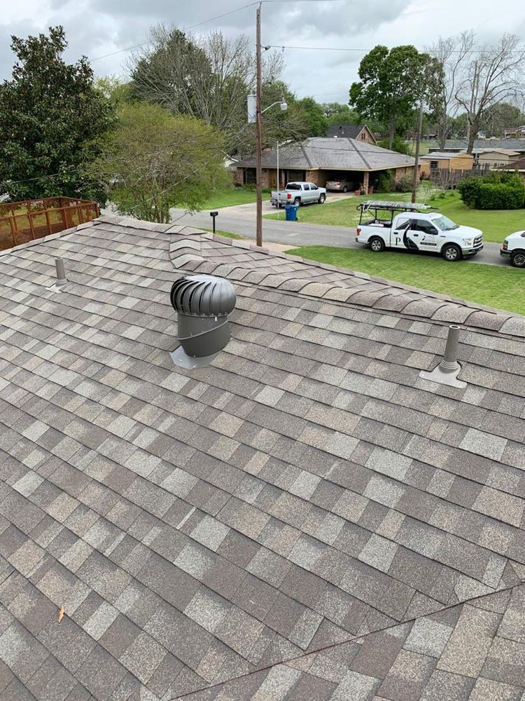 Slide of Pelican Roofing