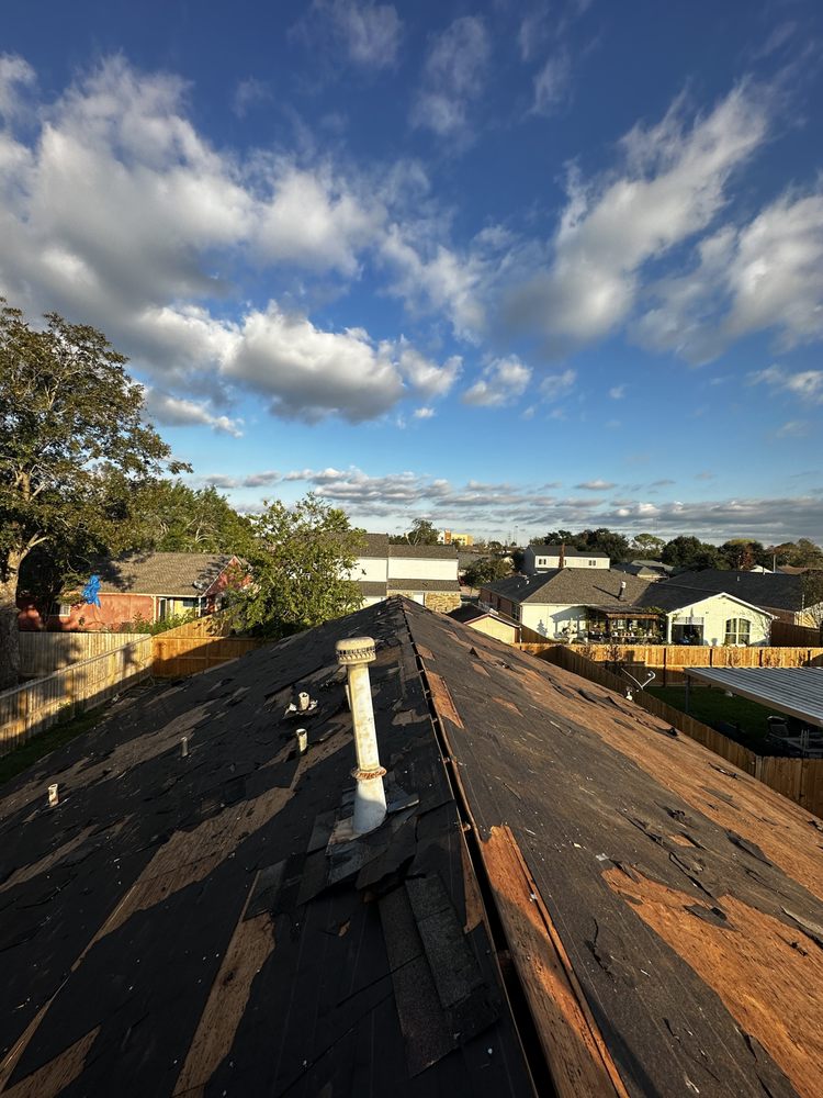 Slide of Space City Roofers