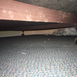 Dirty and dusty under our bed.