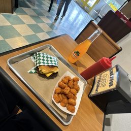 Veggie OG (extra pickles and jalapeños) with fresh hot tots that were soooo goooddd!!