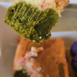Flour Atelier - Bite of strawberry cheesecake matcha bar.
