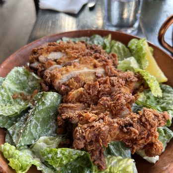 Quinn's - Caesar salad with fried chicken - New American Near Me - Seattle, Washington Quinn's - Caesar salad with fried chicken - New American Near Me - Seattle, Washington