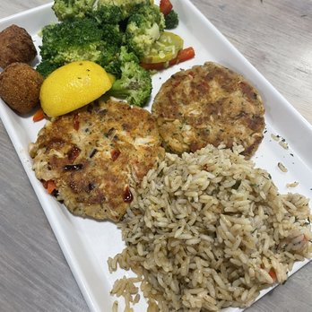 The Fish Joint - Crab cakes with Cajun rice and steamed veggies. - Seafood Near Me - Coconut Creek, Florida The Fish Joint - Crab cakes with Cajun rice and steamed veggies. - Seafood Near Me - Coconut Creek, Florida
