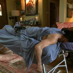 African Massage - We will do whatever it takes to help you have a great massage, including adding your pet to the table.