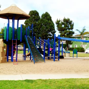 Holiday Park - Big kids' playscape with climbing wall, steep slides, and other jungle-gymy stuff. - Parks Near Me - Carlsbad, California Holiday Park - Big kids' playscape with climbing wall, steep slides, and other jungle-gymy stuff. - Parks Near Me - Carlsbad, California