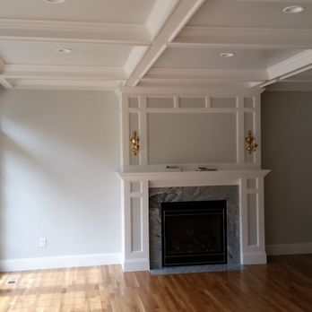 HMHI - a living room with wood floors and a fireplace - General Contractors Near Me - Shrewsbury, Massachusetts HMHI - a living room with wood floors and a fireplace - General Contractors Near Me - Shrewsbury, Massachusetts