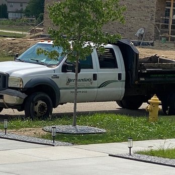 Bernardin Landscaping - a truck parked in front of a house - Lawn Services Near Me - Mokena, Illinois