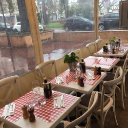 Voglia Di Pasta - Seating arrangements in march. Outside was raining, so they put a cover!