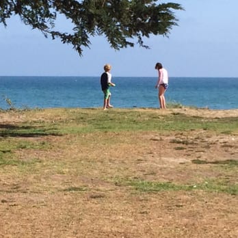 Goleta Beach Park - Grassy area with trees just before sand. - Parks Near Me - Goleta, California
