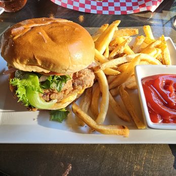 Blossom Grille - a chicken sandwich with fries and ketchup - New American Near Me - Cuyahoga Falls, Ohio