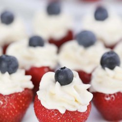 16:3 Cake Studio - Need a dessert for the 4th of July? Our Red White & Blue Cheesecake Stuffed Berries are perfect for feeding a crowd if you choose to share.