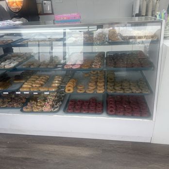 Love Donuts & Coffee - Donut display case - Donuts Near Me - Conyers, Georgia Love Donuts & Coffee - Donut display case - Donuts Near Me - Conyers, Georgia