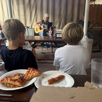 Caveman Cavey's Pizza - Kids watching the live music - Pizza Near Me - Frazier Park, California