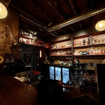 The High Dive - a bar with shelves of liquor - Speakeasies Near Me - New Albany, Indiana The High Dive - a bar with shelves of liquor - Speakeasies Near Me - New Albany, Indiana