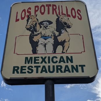Los Potrillos - The sign next to Los Cerrillos, the road you will be driving on when you arrive. - Mexican Near Me - Santa Fe, New Mexico