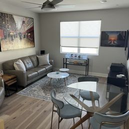 Loft. Not great picture but 65" and speakers mounted to right wall.