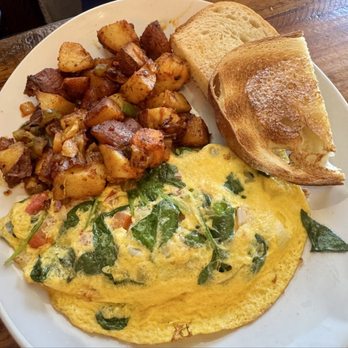 Toast Coffeehouse - Mediterranean Omelet - Breakfast & Brunch Near Me - Port Jefferson Station, New York Toast Coffeehouse - Mediterranean Omelet - Breakfast & Brunch Near Me - Port Jefferson Station, New York