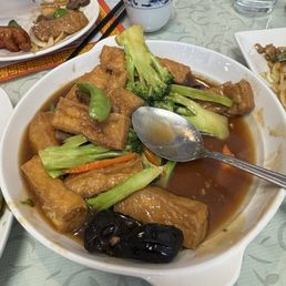 Sweet and sour pork, chicken chow mein and family style tofu