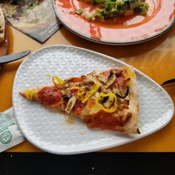 Pizza World - a slice of pizza on a plate - Pizza Near Me - Shrewsbury, Missouri Pizza World - a slice of pizza on a plate - Pizza Near Me - Shrewsbury, Missouri