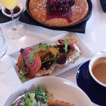 Ocotillo - Ginormous pancake with fresh berry compote,  beet salad and the truffle quiche.  The quiche was unbelievably creamy and delicious. - New American Near Me - Phoenix, Arizona