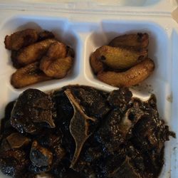 The Jamaican Pot - Large mild oxtails on a bead of beans & rice w/ 2 sides on plantains