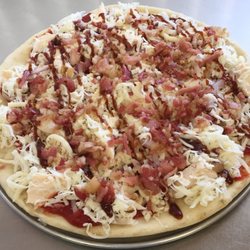A Casa Pizza - Barbecue Chicken  grilled chicken, red onions, crisp bacon and topped with our barbecue sauce