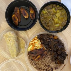 Jamaican Homestyle Cuisine - Curry goat roti, oxtail with rice and peas, and a side of plantains