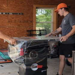 Two Men and a Truck - Movers moving woodworking equipment into new shop!