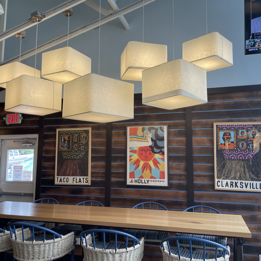 Taco Flats-Clarksville - tables and chairs in a restaurant - Cocktail Bars Near Me - Austin, Texas Taco Flats-Clarksville - tables and chairs in a restaurant - Cocktail Bars Near Me - Austin, Texas