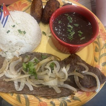 Cuba Libre Camaguey - Bistec de Palomilla / Steak with Onion, plantains and black beans - Cuban Near Me - Winter Springs, Florida Cuba Libre Camaguey - Bistec de Palomilla / Steak with Onion, plantains and black beans - Cuban Near Me - Winter Springs, Florida