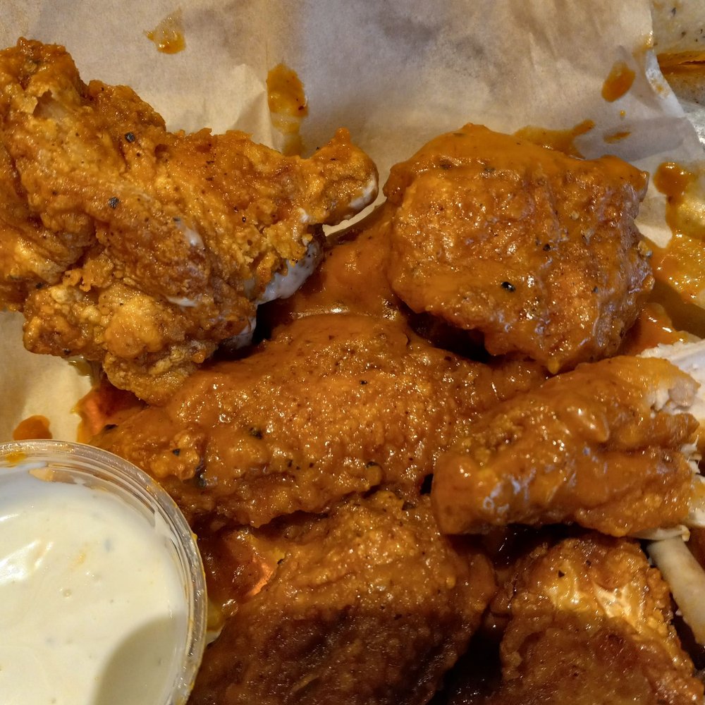 Spicy garlic wings, never received fries. Never got checked to see if my party was good. Didn't get sauce on all the wings. Spicy garlic wings, never received fries. Never got checked to see if my party was good. Didn't get sauce on all the wings.