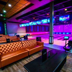 Spare Time Cedar Rapids - Our Elite Suite is the perfect space for luxurious, private parties! Featuring luxury bowling lanes, a private bar and plush seating.