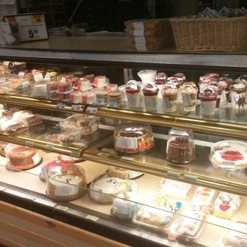 Tops Friendly Markets - a display case filled with desserts - Grocery Near Me - Batavia, New York