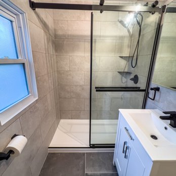 iBathrooms - a bathroom with a shower, sink, and toilet - General Contractors Near Me - Ottawa, Ontario
