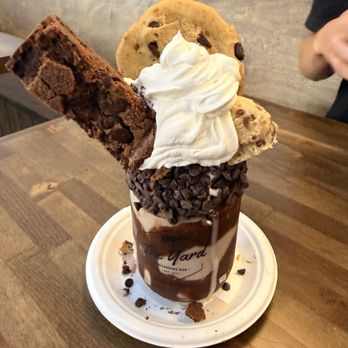 The Yard Milkshake Bar - Brookie batter - Ice Cream & Frozen Yogurt Near Me - Charlotte, North Carolina The Yard Milkshake Bar - Brookie batter - Ice Cream & Frozen Yogurt Near Me - Charlotte, North Carolina