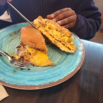 Atticus Cafe - The Hemingway breakfast sandwich with chorizo and the sweet combo with pancakes. - Breakfast & Brunch Near Me - Anaheim, California Atticus Cafe - The Hemingway breakfast sandwich with chorizo and the sweet combo with pancakes. - Breakfast & Brunch Near Me - Anaheim, California